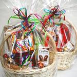 Gift Baskets with any products we carry for any budget.  Try our sweet basket filled with cookies, chocolates and candy -- it's our most popular!
